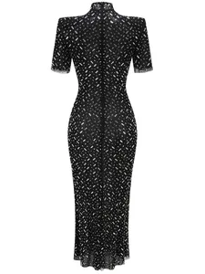 Back view detail of a black rhinestone fishtail evening dress with short sleeves