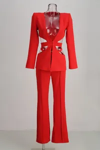 Elegant red two-piece fashion suit featuring hollow waist blazer and flared wide-leg pants