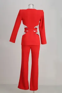 Back view of high-end red blazer suit set with waist cutouts and wide leg trousers