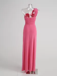 Elegant pink one-shoulder ruched evening gown featuring a sleek floor-length silhouette.