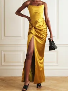 Elegant French style yellow satin maxi dress with a thigh-high slit and knot waist detail