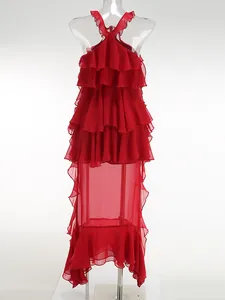 Elegant red tiered ruffle halter maxi dress featuring a sexy sheer skirt design