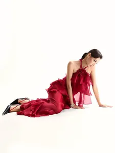 Elegant high-end red ruffled halter maxi dress featuring a decorative 3D flower detail