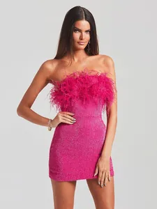 Elegant hot pink sequin strapless mini dress featuring premium ostrich feather trim