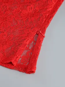 Detailed macro shot of elegant red floral lace material with hidden invisible zipper