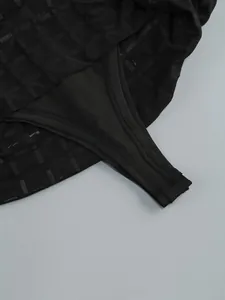 Close-up view of the bodysuit lining detail on a sexy sheer rhinestone bodycon dress