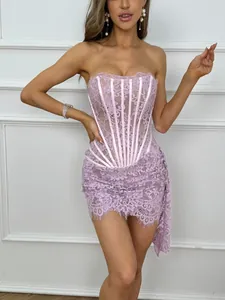 Detailed view of elegant purple lace corset dress with sheer paneling