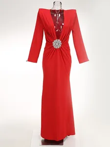 Elegant red deep V-neck long-sleeve maxi dress with pleated waist and crystal brooch