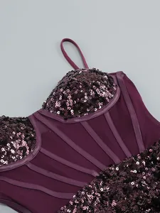 Close-up detail of purple sequin corset dress with mesh panels and thin straps.