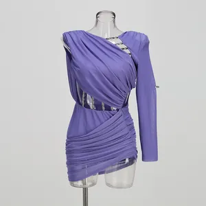 Detailed view of a purple one-shoulder bodycon dress featuring cut-outs and chain details
