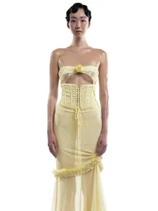 Sexy yellow lace-up bandeau dress with flower detail and sheer mesh splicing