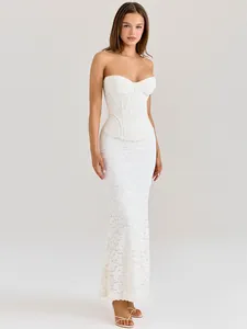 Elegant white lace strapless evening gown with a corset bodice and mermaid silhouette.
