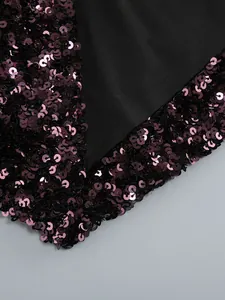Macro view showing the intricate detail of deep purple sequins on an evening dress