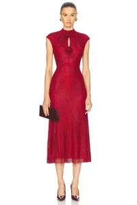 Detailed view of an elegant red rhinestone evening dress featuring delicate floral rosettes