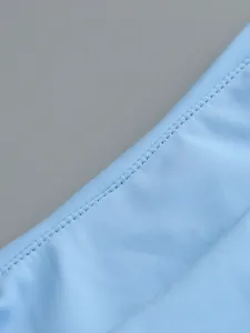 Close-up detail of neat stitching on a light blue sexy one-shoulder pleated maxi dress