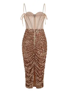 Detailed back view of an elegant gold sequin bodycon dress with sheer mesh corset