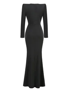 Back view of elegant black long-sleeved evening gown with structured shoulders