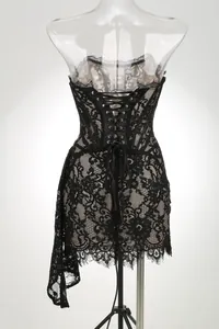 Detailed back view of a black lace corset dress with elegant lace-up ribbon closure