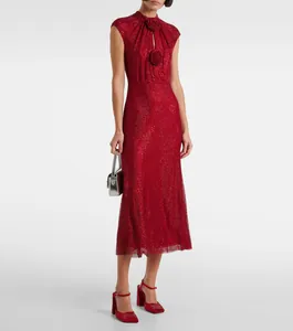 Elegant red sparkling evening gown with floral decoration and bodycon silhouette