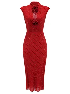 Detail of red bodycon evening dress featuring sparkling rhinestones and 3D floral accents