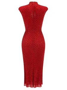 Detail shot of a red bodycon evening dress with sparkling rhinestones