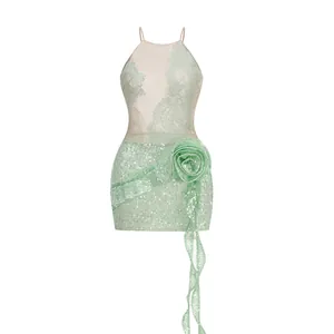 Mint green sequined halter mini dress with lace detail and elegant 3D floral accent