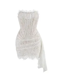 Detailed view of an elegant white lace corset mini dress featuring a strapless strappy bodice.