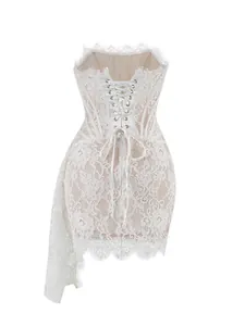 Detailed back view of elegant white lace corset dress with lace-up ribbon closure