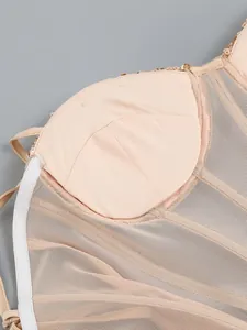Detail view of dress bust area showing built-in cup and mesh fabric
