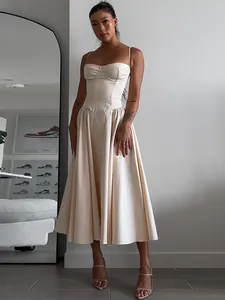 Elegant beige spaghetti strap corset maxi dress for evening banquets and formal occasions