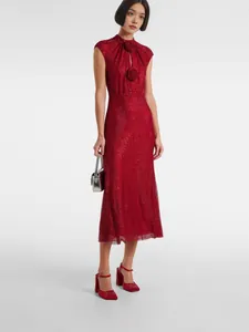 Elegant red rhinestone maxi dress with floral detail and shimmering sequin finish