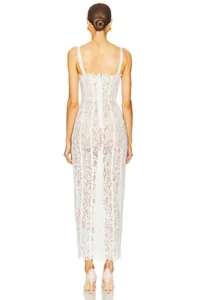 Detailed back view of a white lace evening dress with corset bodice and zipper.