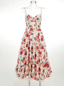 Detailed view of an elegant floral camisole dress with a full mesh lining skirt
