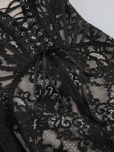 Detailed close-up view showing the intricate black floral lace and elegant ribbon lacing.