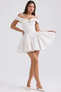 Full view of off-the-shoulder floral skater dress with delicate straps on model