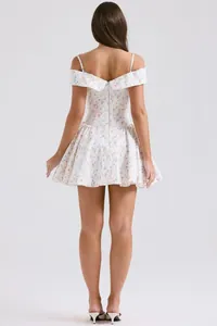 Detailed back view of a white floral off-the-shoulder puffy mini dress with thin straps