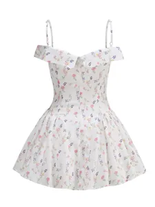 Close-up detail of a white off-the-shoulder floral dress with elegant spaghetti straps