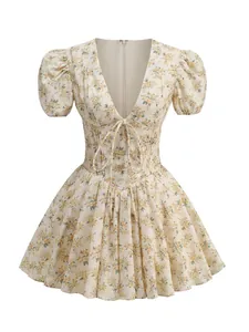 Front view of floral deep V-neck dress with puff sleeves and tie-front waist
