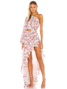 Elegant one-shoulder asymmetric floral maxi dress with ruffled hem and waist cutout