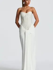 Elegant white sequined strapless evening gown with draped bodice and floor-length skirt