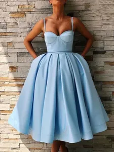 Elegant light blue corset midi dress with a pleated A-line skirt and thin straps