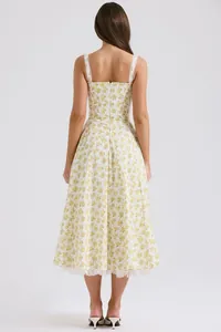 Back view of a floral printed camisole midi dress featuring elegant lace hem detail