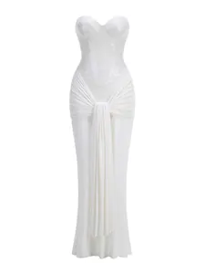 Elegant white sequined strapless evening gown with ruched waist and long pleated drape.