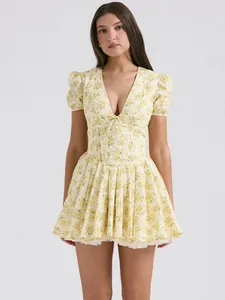 Elegant yellow floral deep V-neck mini dress with puff sleeves and flared skirt style