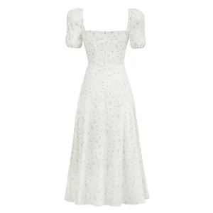 Back view of an elegant white French-style midi dress with a delicate pink floral pattern