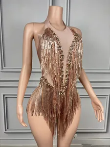 Detailed view of luxury champagne gold sequined fringe bodysuit with crystal neckline detail