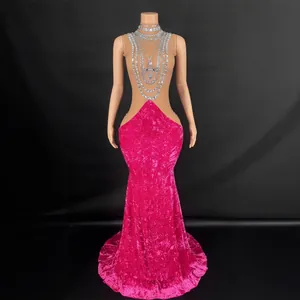 Elegant magenta velvet mermaid evening gown with luxury rhinestone collar and floor-length hem.