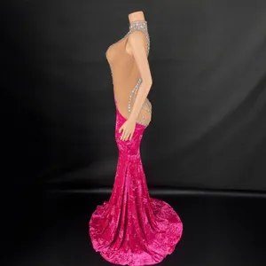 High neck rhinestone velvet mermaid dress in hot pink, floor-length evening gown on mannequin