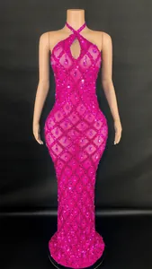 Stunning fuchsia halter floor-length dress with sparkling teardrop rhinestones and sequins