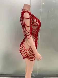 Avant-garde red velvet rope cage mini dress with silver chain accents for party events